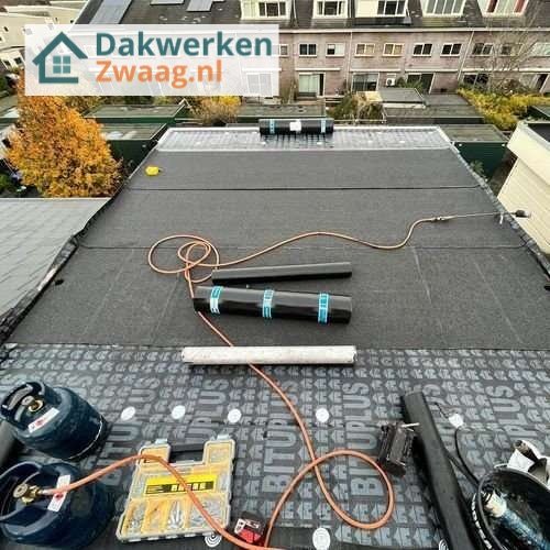 Plat dak Zwaag opnieuw leggen